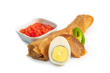 Classic Yemenite Jachnun. A classic Jewish Yemenite meal of Jachnun, grated tomato, boiled egg and hot pepper. Usually served for breakfast or lunch on Shabbat (Saturday)