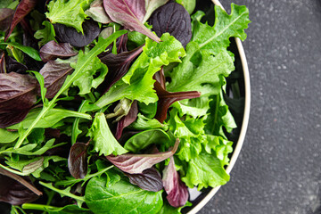 Healthy salad leaves mix salad juicy snack micro greens, arugula, lettuce, oak leaf, green leaf...