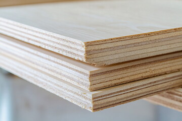 Stacked Plywood Sheets – High-Quality Wooden Panels – A neat stack of premium plywood sheets, ideal for furniture, flooring, and DIY woodworking projects.

