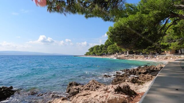 A beautiful beach in Brela. There is a promenade along the beach.