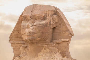 The Great Sphinx of Giza is a sphinx statue located in the Giza pyramids area in Cairo, the capital...