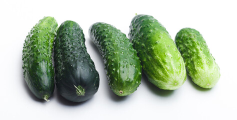 A fresh, vibrant green cucumber on a clean white background, highlighting its crisp texture and natural color