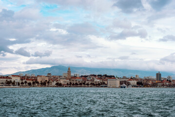 Panoramic view of Split, Croatia from the sea with mountains in the background