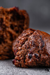 Rich chocolate muffin infused with juicy berries, perfect for an indulgent dessert experience