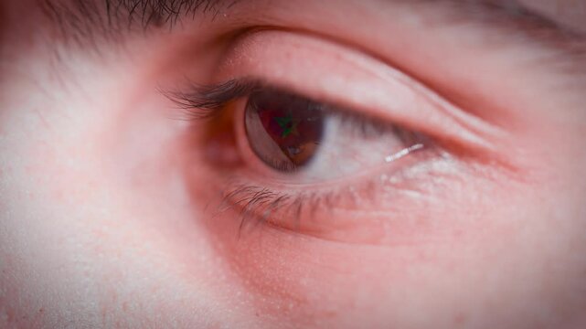 4K Macro Shot of Eye with Morocco Flag Reflection