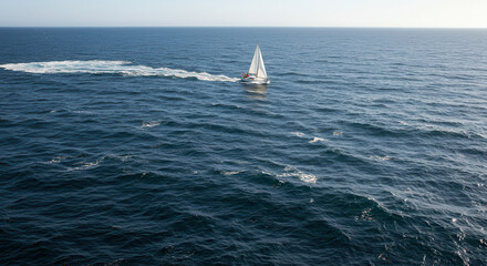 Sailing Adventure on a Blue Ocean with Sailboat and Waves at Horizon