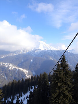 View of Apharwat Peak from Gulmarg Gondola ropeway at Kongdoori, Gulmarg, Jammu and Kashmir, India. Gulmarg Gondola is one of the highest in the world reaching 3,979 metres above sea level.