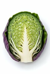 Fototapeta premium A halved cabbage with a vibrant green interior and purple outer leaves, showcasing the beauty and detail of natural produce on a white background