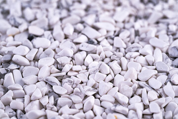 gravel chips Polished white Howlite close-up detail