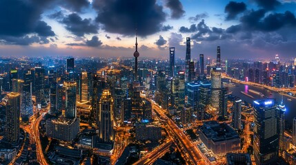 Fototapeta premium Shanghai skyline at twilight, showcasing illuminated skyscrapers and a vibrant cityscape view