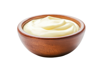 Creamy condiment served in a wooden bowl, cut out