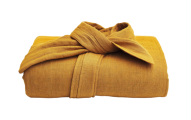 Traditional Monk's Robe Carefully Folded in Meditation Preparation Isolated on transparent background.