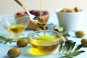 Liquid Gold Olive Oil Beautifully Drizzling Smoothly from a Spoon in Culinary Delight