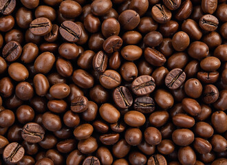 Fototapeta premium Close-up image of a pile of roasted coffee beans.