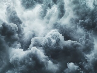 Obraz premium Dense cloud texture in various shades of gray dramatic cloudscape