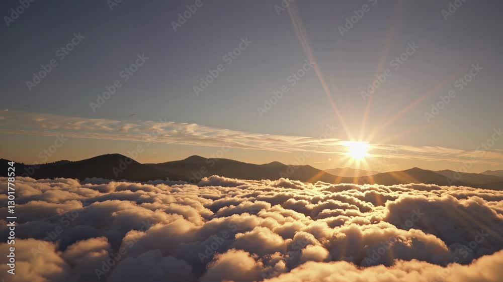 Poster sunrise over mountain range with clouds, serene sky view. peace and tranquility concept