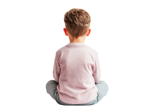 Child sitting cross-legged in casual attire, cut out