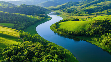 winding river flows through lush green hills, showcasing vibrant colors and serene nature