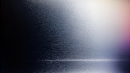 An abstract close-up of a metal surface with a modern gradient effect, creating a smooth and futuristic look