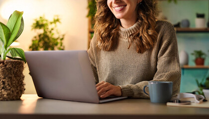 Fototapeta premium A smiling woman in a cozy beige sweater works on their laptop at home, surrounded by houseplants in a warm and inviting workspace setting. Generative AI