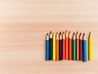 Obraz premium Photo - Colorful Pencils on Wooden Table, Creativity and Art Supplies