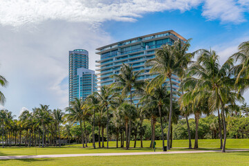 MIAMI, FLORIDA - CIRCA JULY, 2022: South Pointe Park with grass field and coconut trees