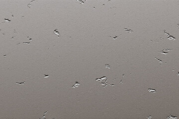 Distressed gray metal surface evoking industrial mood in abstract composition