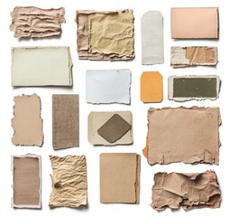 A collection of various torn paper, cardboard, and cardstock pieces in different sizes and colors, with empty labels for text or design elements on a white background