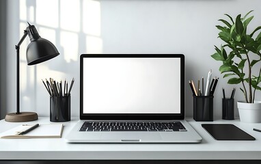 Fototapeta premium a laptop and other office supplies