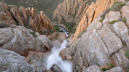 Obraz premium Canyon waterfall scenic vista, flowing water, rocks, nature