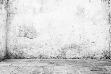 Grunge white wall and stone floor texture.