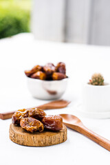 Portrait photo of delicious sweet dates, sweet dried dates that are popular during the month of Ramadan, a typical fruit of the fasting month