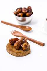 Portrait photo of delicious sweet dates, sweet dried dates that are popular during the month of Ramadan, a typical fruit of the fasting month
