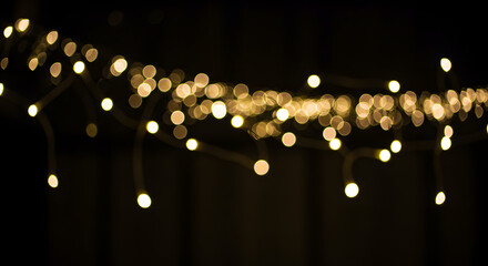 Warm golden bokeh lights string festive holiday decoration background of on transparent background