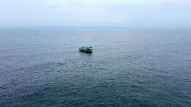 Aerial view over traditional wooden fishing boat at Java Sea Indonesia 