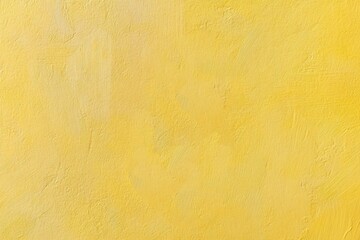 The textured painted wall displays shades of bright yellow hues