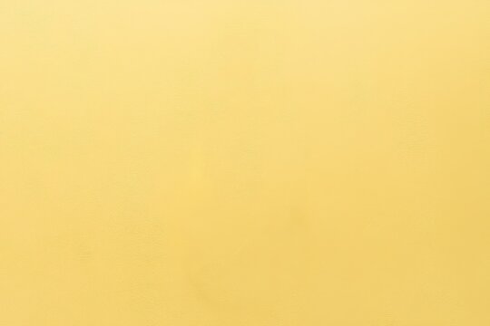 A plain background showcases an expansive and uniform yellow surface