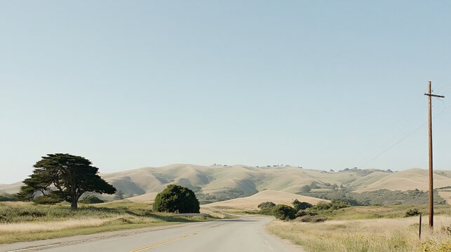 Rural road trip, sunny hills, open sky, travel blog