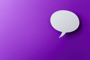 A single white speech bubble floating on a purple surface