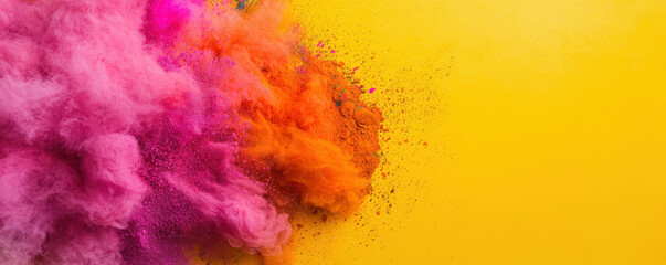 Obraz premium A vibrant explosion of colorful powders against a bright yellow background, evoking a sense of celebration and energy.