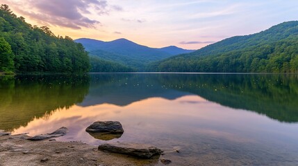 Serene sunset reflection on mountain lake