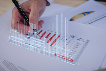 Businessman touch investment growth graph chart and analysing growth achievement diagram data...