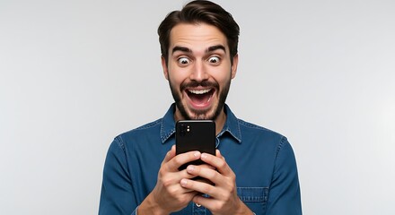 Excited Man Looking at Phone Smiling and Holding the Device