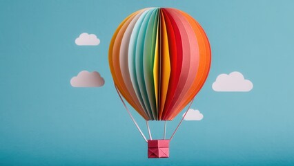 Fototapeta premium A whimsical paper hot air balloon floats against a serene blue sky