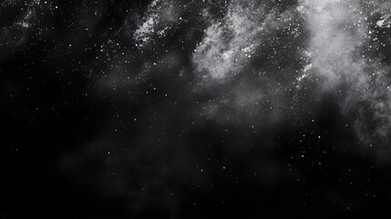 Obraz premium Abstract monochrome backdrop with subtle white specks scattered on a deep black surface