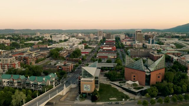 4K drone view over the Tennessee River, looking into downtown Chattanooga, USA on a spring evening