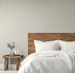 Minimalist bedroom with wooden headboard and white bedding.