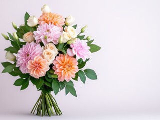 Obraz premium A vibrant bouquet of pink and orange flowers against a soft pastel background