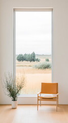 Fototapeta premium Contemporary chair and plant beside large window with serene landscape view