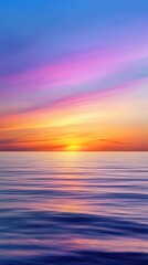 Obraz premium Vibrant sunset over calm ocean coastal landscape serene view tranquil environment nature's beauty